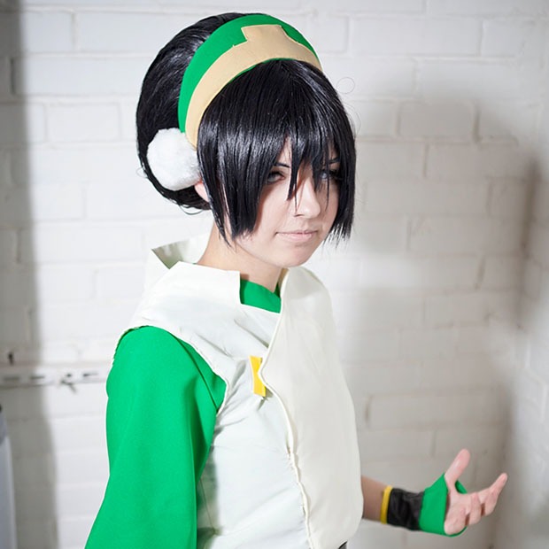 Young girl in cosplay wearing custom contact lens