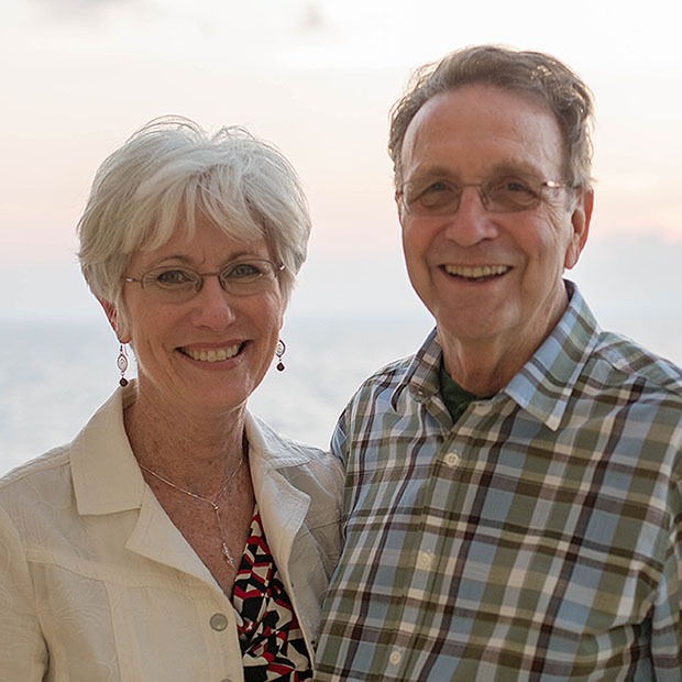 Picture of older man and older woman smiling