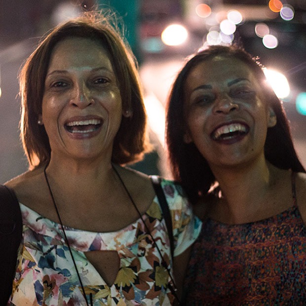 Two older woman outside smiling